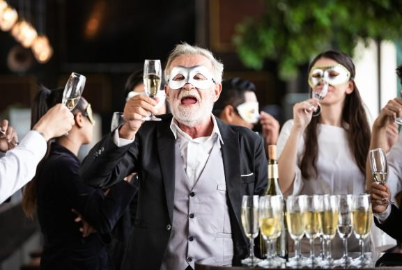 group-of-office-worker-in-fancy-mask-having-celebration-party-.jpg